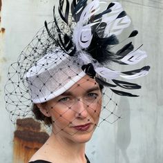 This Handmade One Of A Kind Fascinator Is Fun And Elegant And Is Sure To Delight. Designed With High Quality Sinamay, French Made Grosgrain Ribbon, Vailing And Premium Feathers. Comes With A Hat Box. This Fascinator Will Make A Wonderful Addition To Your Kentucky Derby, Or Ascot Ensemble Chic White Fitted Costume Hats And Headpieces, White Structured Crown Hat For Races, White Gatsby Style Fascinator For Evening, Fitted White Hat Headpiece, White Fitted Hat For Races, Fitted White Headpiece For Church, Chic White Hat With Structured Crown, Chic Fitted White Mini Hat, White Fitted Hat With Pinched Crown