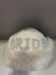 🤍 Winter Bride Hat 🤍 This stunning hat makes the perfect accessory for any bride to be. Stand out and sparkle on your hen weekend or winter wedding with this beautiful bride hat! The perfect accessory for any hen party vacay or wedding day  All products come gift wrapped in tissue paper plus bubble wrap in a cardboard gift box ensuring a safe arrival and making the perfect gift.  **Please note each item is handmade therefore there maybe small visible glue marks around the lettering** ^^We do n Bride Winter, Bride Vibes, Hen Weekend, Bride Hat, Bride Headpiece, Winter Bride, Cardboard Gift Boxes, Bride To Be, Hen Party