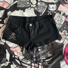 These trendy low-rise denim shorts feature a unique rhinestone skeleton embellishment, making them a standout piece in your wardrobe. Perfect for adding a touch of edginess to any outfit, these shorts are both stylish and eye-catching.  **Options:** 1. One pair of shorts without a leg loop. 2. One pair of shorts with a leg loop.      	 		 			Size 			S 			M 			L 		 		 			Waist 			71 			75 			79 		 		 			Hips 			88 			92 			96 		 		 			Length 			27 			28 			29 Gothic Summer Shorts For Streetwear, Punk Style Cotton Shorts For Streetwear, Emo Style Cotton Bottoms For Summer, Summer Emo Cotton Bottoms, Summer Cotton Emo Bottoms, Gothic Shorts For Alternative Summer Fashion, Skull Print Cotton Bottoms For Streetwear, Punk Style Bottoms With Skull Print For Alternative Fashion, Trendy Short Bottoms For Alternative Fashion