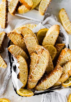 sliced lemon and garlic bread sticks in a basket