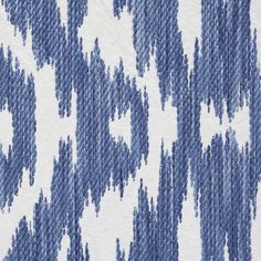 blue and white fabric with an abstract pattern