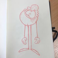 a drawing of a cartoon character is shown in red ink on a white paper with black trim