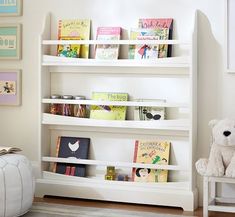 a white bookshelf in a child's room