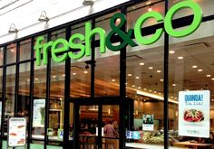 a store front with the words fresh & co on it