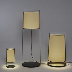 three lamps, one with a light bulb and the other without