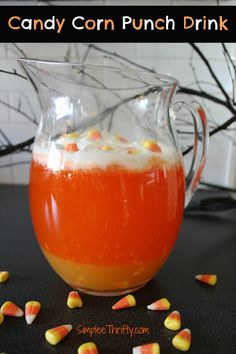 candy corn punch drink in a pitcher