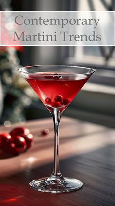 a red cocktail in a martini glass with cherries on the rim and text that reads contemporary martini trend