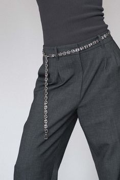 Refined and versatile, the Eris Silver Chain Belt is a statement piece that reflects Lapo Lounge's commitment to timeless design. Made from durable stainless steel, this belt showcases a minimalist yet striking chain-link pattern. Wear it to cinch your waist, pair it with trousers or style it as a necklace for a fresh, fashion-forward approach to accessorizing. Whether you're dressing up or down, the Eris is designed to enhance any ensemble with a touch of modern luxury. The chain is completely Pearl Outfit, Silver Chain Belt, Silver Gold Necklace, Hair Charms, Streetwear Inspo, Silver Belt, Fresh Fashion, Chain Belts, Silver Belts