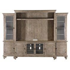 a large wooden entertainment center with glass doors on the front and side panels, in an antique style