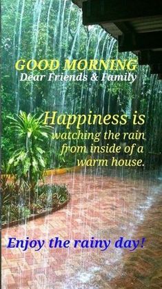 the rain is pouring down from the roof and into the ground, saying good morning dear friends & family happiness is watching the rain from inside of a warm house