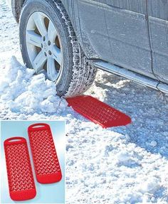 two red snow guards are attached to the side of a car in the snow,