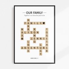 a crossword poster with the words our family on it and an image of a dog's paw