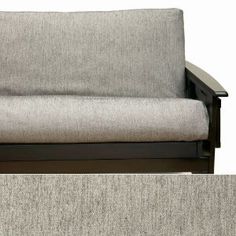 a couch that is sitting on top of a wooden frame and the bottom one has a gray fabric upholster