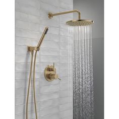 the shower head and handset are shown in this bathroom setting with white tile walls