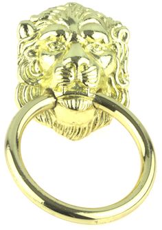 a gold lion head ring on a white background