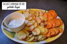 the best homemade to - try potato chips with ranch dip is ready on the plate