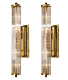 two wall lights that are gold and clear