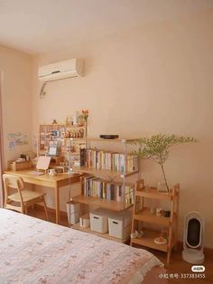 a bedroom with a bed, desk and bookshelf