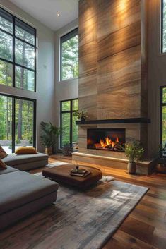 modern living room with fireplace and large windows