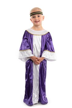 a little boy dressed up in a purple and white outfit with gold trimmings