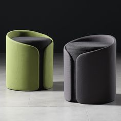 two different colored stools sitting next to each other