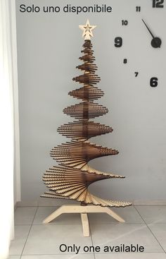 a christmas tree made out of wooden strips