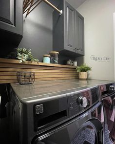 a washer and dryer in a small room