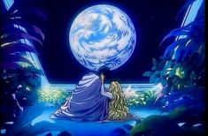 a woman sitting on the ground in front of a giant blue moon with trees around her