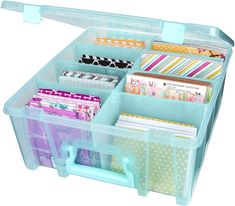 a plastic storage box filled with lots of papers