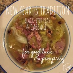 a white plate topped with meat and cabbage soup