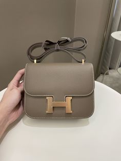 Hermes Constance 18Etoupe Epsom RGHWSize 18 x 14 x 5cmZ StampMar 2022New w SealIncludes full set box, dust bag and receiptPrice now 19,200 sgd 14,350 usd CN5474-01