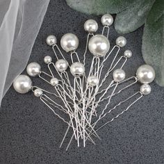 This is set of 18 pearl bridal hair pins. Wedding Hair Pins are stunning accessory for your wedding. These Silver Hair Pins are hand crafted and creating a glamorous and sophisticated look. Perfect for brides, bridesmaids, or any special occasion, this hair pins adds a touch of sparkle and style to your hairstyle. It effortlessly complements any wedding updo, enhancing your overall bridal look. ❤ Beautiful set of bridal hair pins for your special day!  ❤ Wedding hair pins are the perfect wedding hair accessory for the bride. ❤ Handmade Hair Pins For Wedding, Silver Hair Pins, Bridal Hairpins, Pearl Bridal Hair, Bridal Hair Pins Pearl, Hair Pins Wedding, Hair Pins Bridal, Silver Hair Pin, Pearl Hair Pins