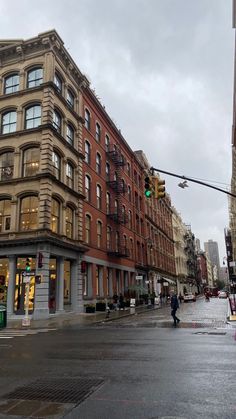 a street corner with buildings and traffic lights