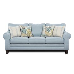 a blue couch with two pillows on it