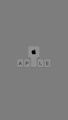 an apple logo is shown on the side of a gray background with letters that spell out