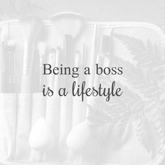 the words being a boss is a lifestyle surrounded by makeup brushes in a white case