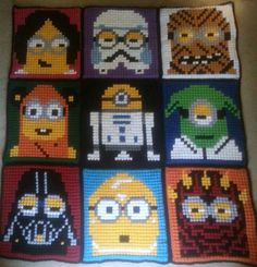 a cross stitch rug with many different characters on it, including the character from star wars