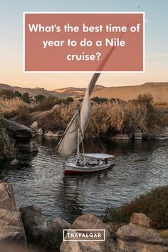 a sailboat in the water with a sign that says what's the best time of year to do a nile cruise?