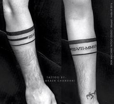 two black and white tattoos on both legs with the words tattoo art written across them