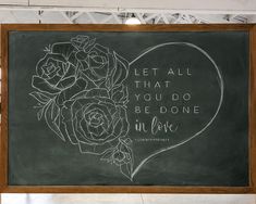 a chalkboard with roses on it that says, let all that you do be done in love