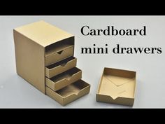 an open cardboard box with three drawers and the words card board mini drawers below it