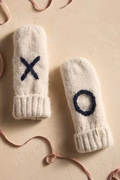 Treat someone you love to the cozy warmth of these flip-top mittens, perfect for bundling up on winter strolls. Each pair is lined with plush fleece and finished with ‘XO’ details. About Mersea: Mersea’s story began in 2013 with a passion for travel and the nostalgic scents that come along with it, which led founders Mel and Lina to uncover the creations of artisans around the world. Today, Mersea offers a curated collection of travel essentials crafted entirely for your journey—wherever you may go. | Mersea XO Mittens at Terrain Cold Weather Travel, Winter Travel Outfit, Trip Outfits, Knit Mittens, Winter Travel, Winter Accessories, Fashion Essentials, Mitten Gloves, Travel Essentials