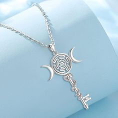 This stunningly crafted Triple Moon Hekate Wheel Necklace is the perfect gift for Wiccans and anyone looking to add a beautiful piece of jewelry to their collection! Crafted from 925 Sterling Silver, this necklace is nickel-free, lead-free, cadmium-free, and hypoallergenic, making it safe to wear for long periods of time 🤍. Pendant Size :56.6*29.6mm；Weight:6.32g; Chain size: 18 inch ( 46cm) ,Chain width 1.1 mm Package: Package Included (To Choose one of 3 Different Sets) 1. 1x Only Pendant+1x S Triple Moon Necklace, Hekate Necklace, Hekate Wheel, Triple Goddess Jewelry, Hecate Wheel, Moon Goddess Jewelry, Jewelry Witchcraft, Witchcraft Jewelry, Hecate Goddess