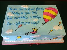 a birthday cake decorated with an image of a hot air balloon