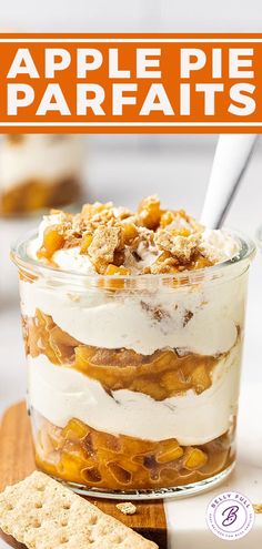 an apple pie parfait in a glass dish with crackers on the side