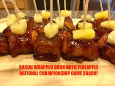 the bacon wrapped duck with pineapple national championship game snack is ready to be eaten