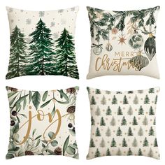 four christmas pillows with evergreen trees and pine cones on them, all in gold lettering