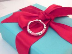 Authentic Tiffany & Co Ring 100% authentic Hallmark is shown in the picture Tiffany pouch only included. Tiffany box not included! Tiffany Melody Ring, Tiffany Co Rings, Signature Ring, Tiffany Box, Signature Rings, Pink Enamel, Ring Band, Tiffany & Co., Hallmark