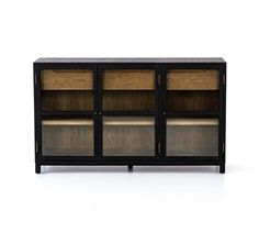 the sideboard is made out of wood and has two glass doors on each side