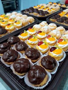 trays filled with different types of pastries